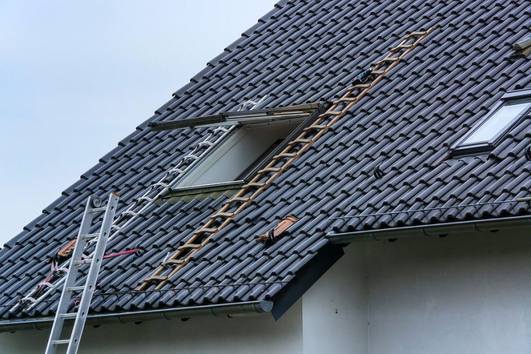 Roofing, installation or repair of a roof window on a pitched roof